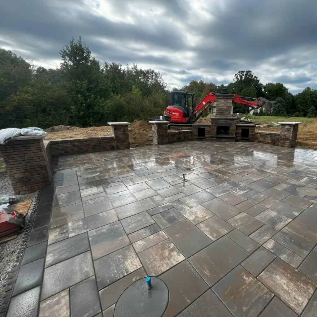 final phase of construction on a paver stone patio