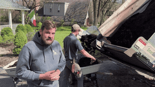 Carmel Landscapes uses advanced techniques and specialized equipment to install mulch for Northeast Ohio homes, like this mulch conveyor to increase productivity and decrease labor costs for clients.