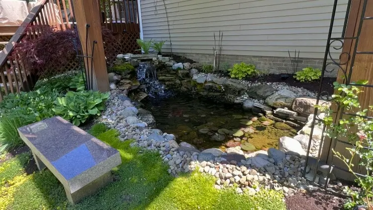 Hardscape construction pond and waterfall in Chagrin Falls by Carmel Landscapes